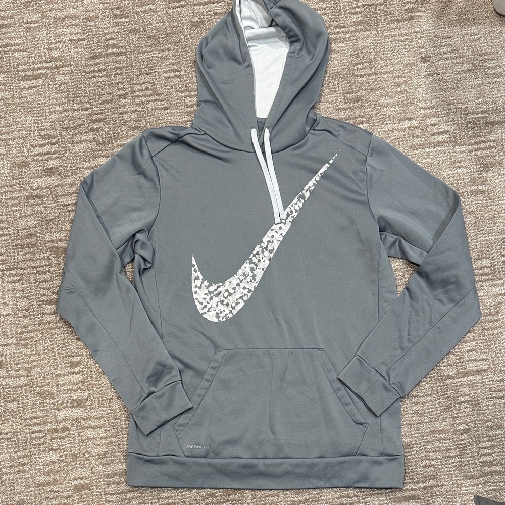 Nike hoodie for women, size large. Gray, with camo gray Nike swoosh.